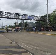 Paso cerrado en el kilómetro 13 de la carretera a Masaya, vía que conduce hacia la entrada al municipio de Ticuantepe. Foto: Margin Pozo.