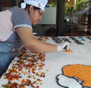 El World's Record Guinness por el pastel de frutas más largo del mundo fue obtenido en el año 2013.