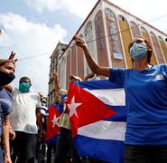 La población cubana marchó este domingo. El presidente Díaz-Canel instó a sus partidarios a salir a las calles listos para el "combate", como respuesta a las protestas .