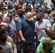 La población cubana marchó este domingo. El presidente Díaz-Canel instó a sus partidarios a salir a las calles listos para el "combate", como respuesta a las protestas .