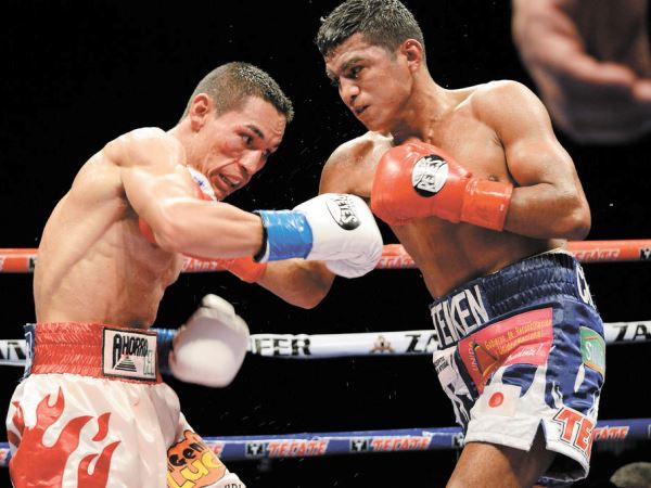 Momentos del primer combate entre Chocolatito vs Gallo. 